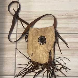 Jimmi Wz Leather crossbody bag. 9 in wide and 12 in long.